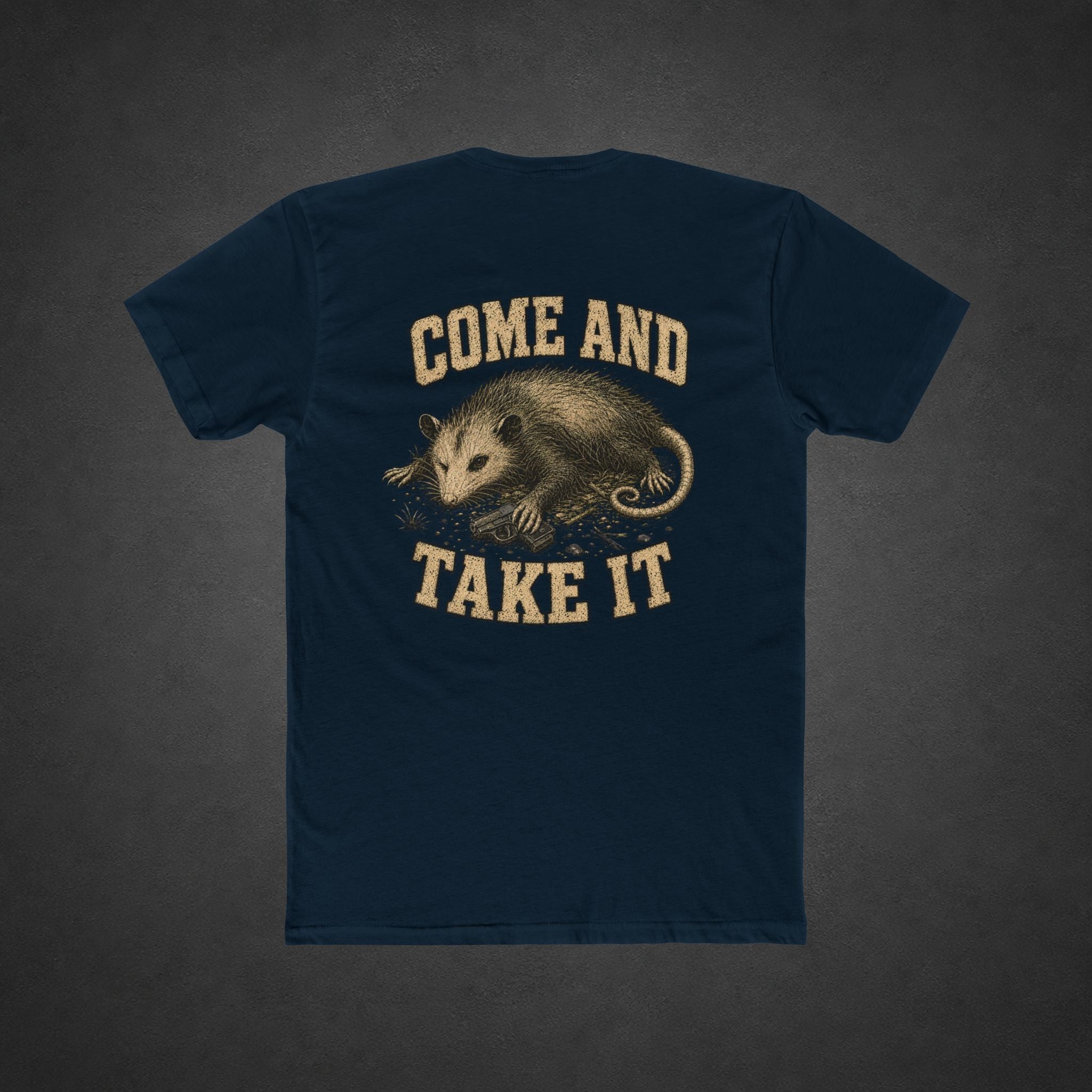 Come and Take It Tee — t-shirt printed with a battle-worn opossum gripping a pistol and “COME AND TAKE IT” lettering