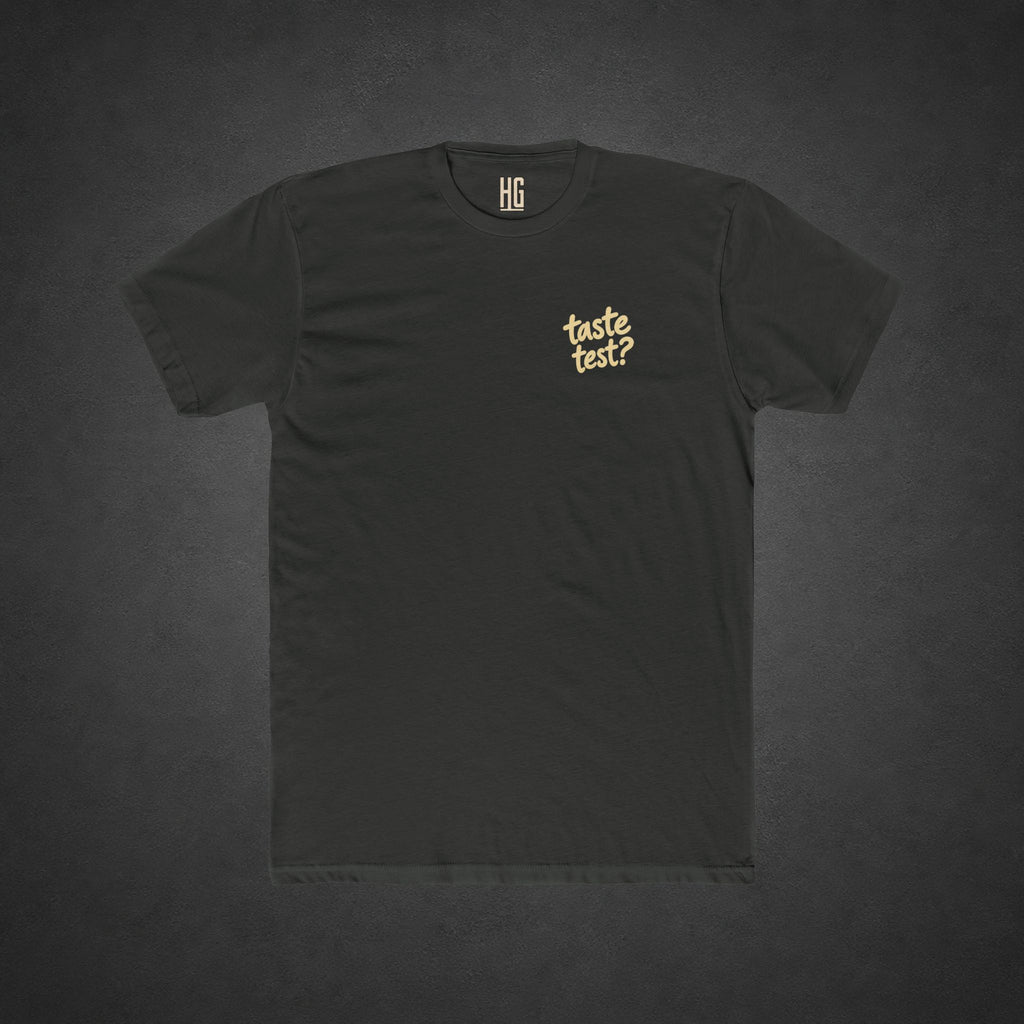 Taste Test Tee — t-shirt printed with a grinning cartoon opossum pointing a pistol next to the words “Taste Test?”